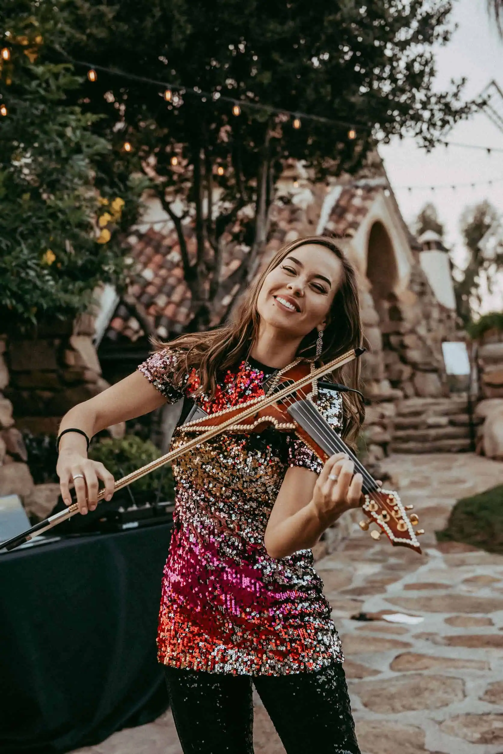 a woman plays the violin