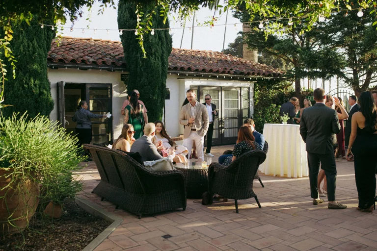 Wedding guest chatting in The Casino San Clemente